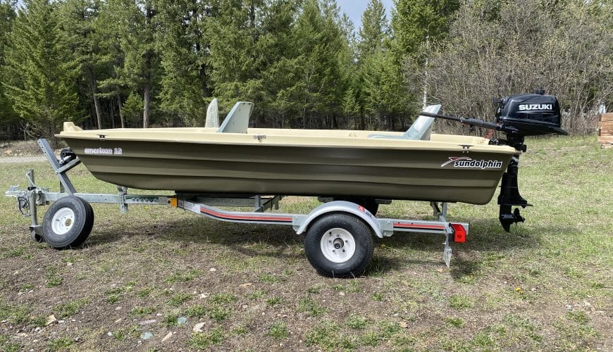2022 Suzuki 6 horsepower outboard with Stirling Trailer & Jon-Boat, all as new.